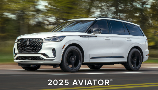 A 2022 Lincoln® Aviator Black Label is shown being driven on a mountain road where all-wheel drive could be helpful