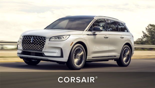 A 2022 Lincoln Corsair Sport Package model is parked in on pavement with sunlight showing off sharp design cues
